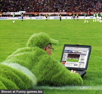 using laptop on soccer ground funny picture